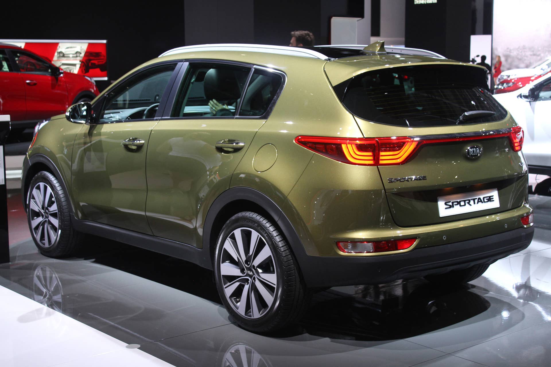 The 2016 Kia Sportage, revealed at the 2015 Frankfurt Motor Show, rear three-quarter view.