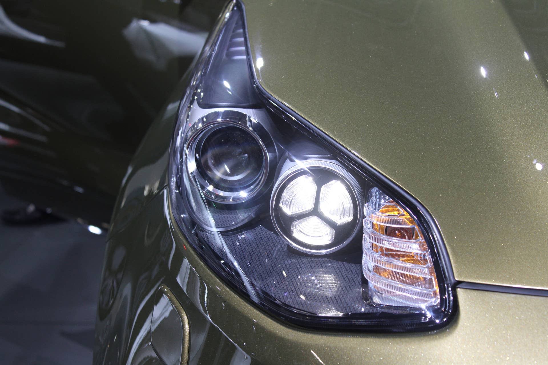 The 2016 Kia Sportage, revealed at the 2015 Frankfurt Motor Show, headlight detail.