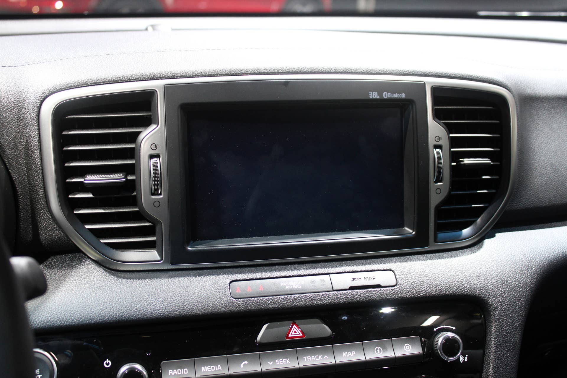 The 2016 Kia Sportage, revealed at the 2015 Frankfurt Motor Show, infotainment screen atop the center console.