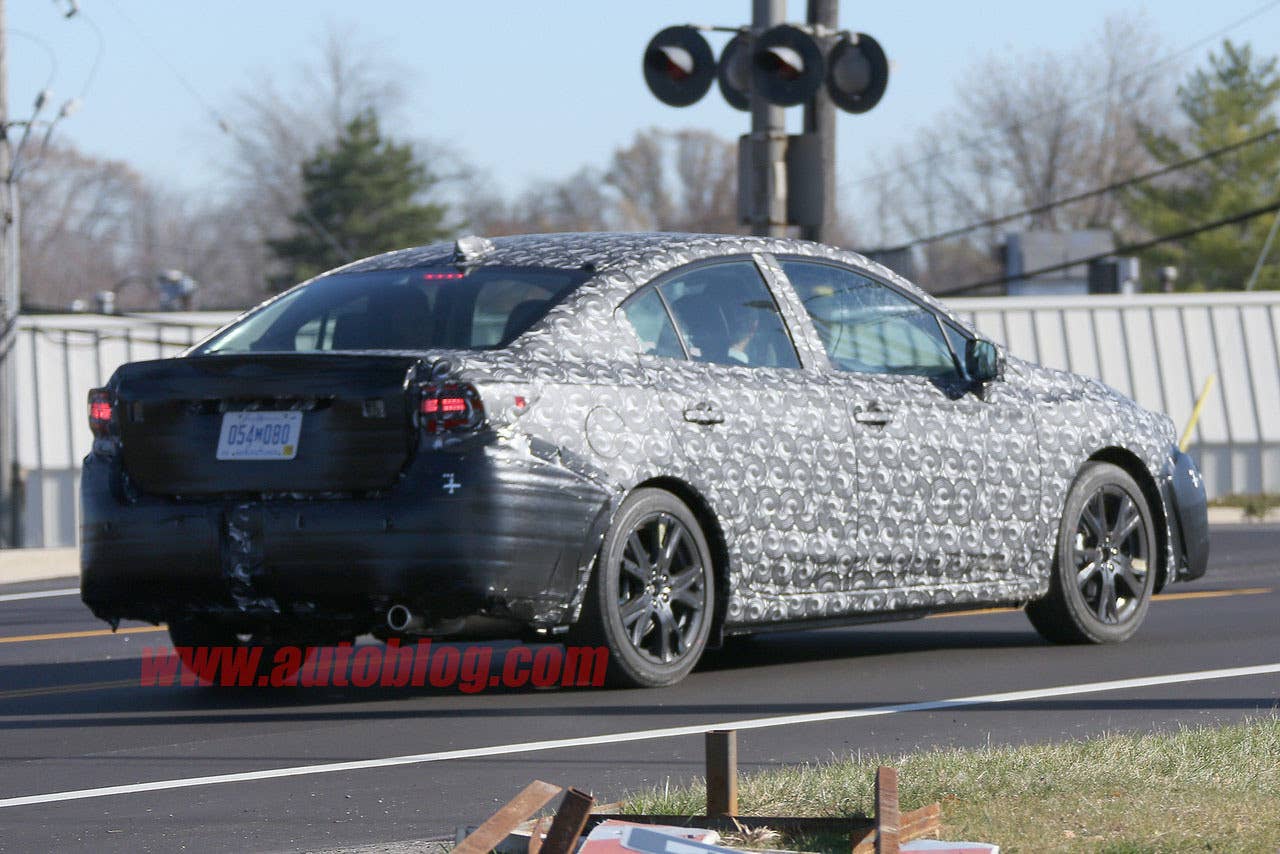 camouflaged 2017 subaru impreza spy shots rear bumper