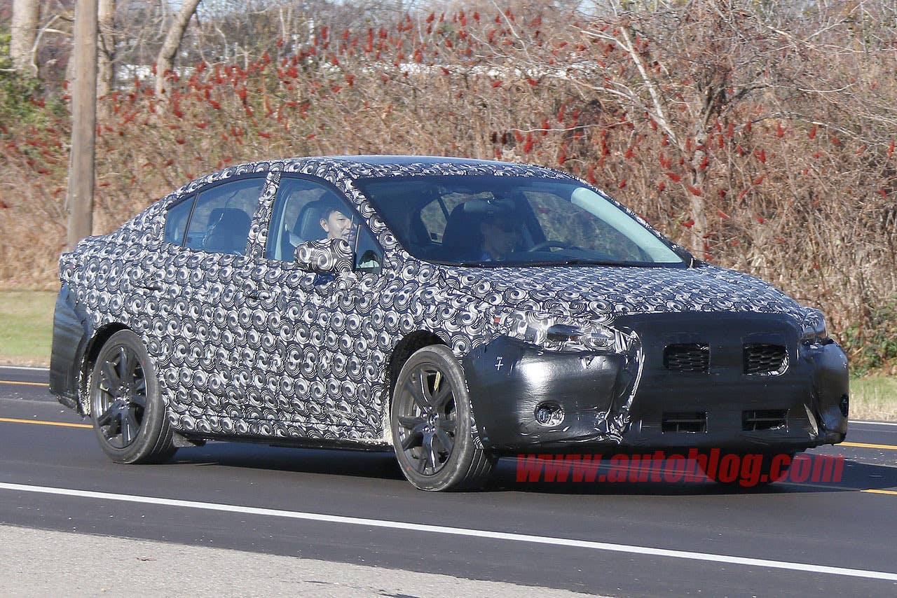 camouflaged 2017 subaru impreza spy shots three quarters