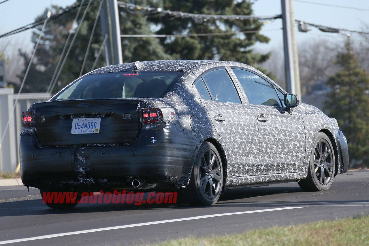 camouflaged 2017 subaru impreza spy shots back