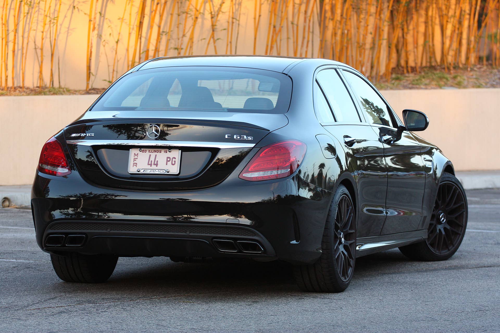 2015 Mercedes-AMG C63 S rear 3/4 view