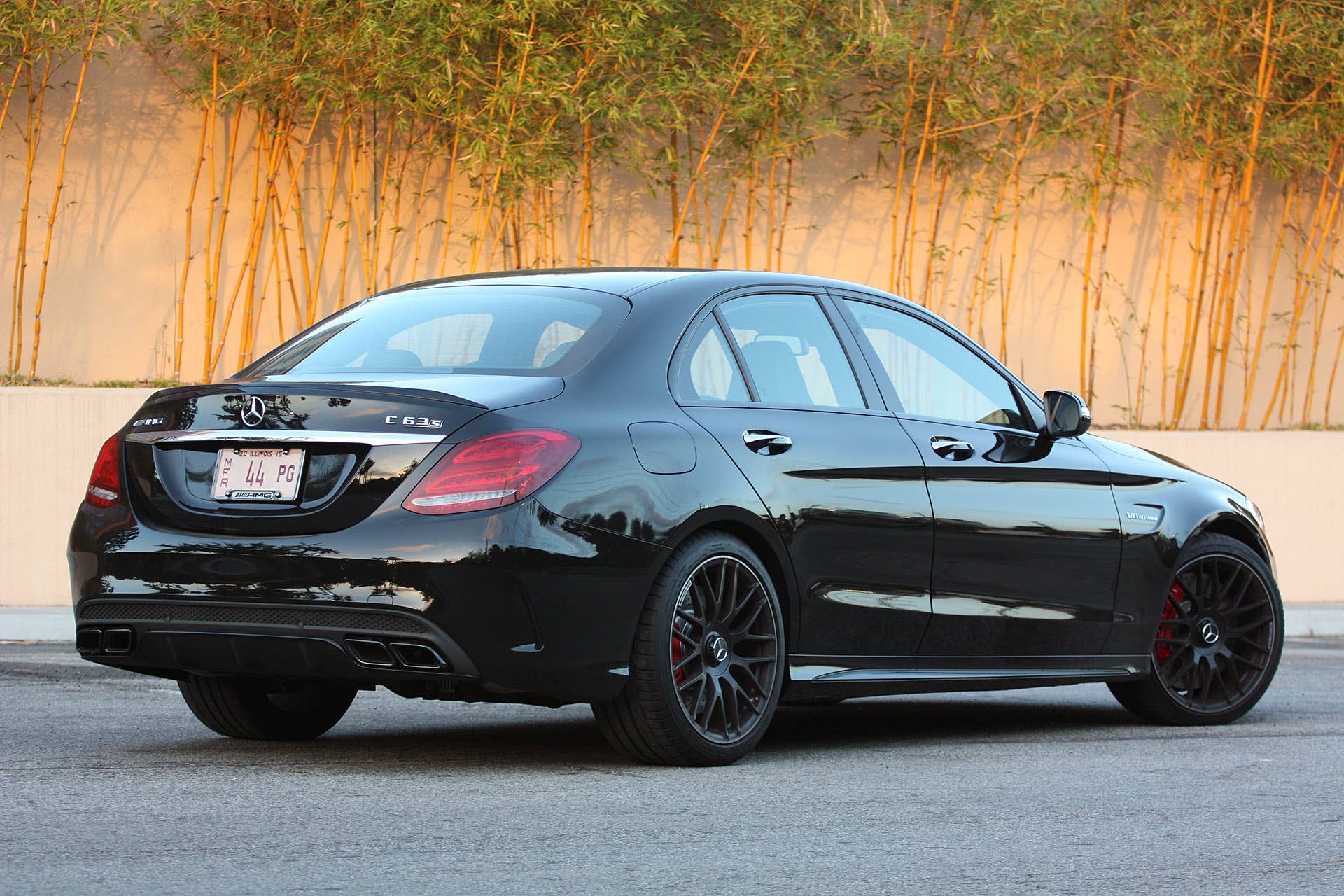 2015 Mercedes-AMG C63 S rear 3/4 view