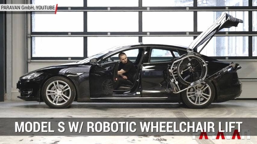 Telsa Model S With Robotic Arm Lifts Wheelchair | Autoblog Minute