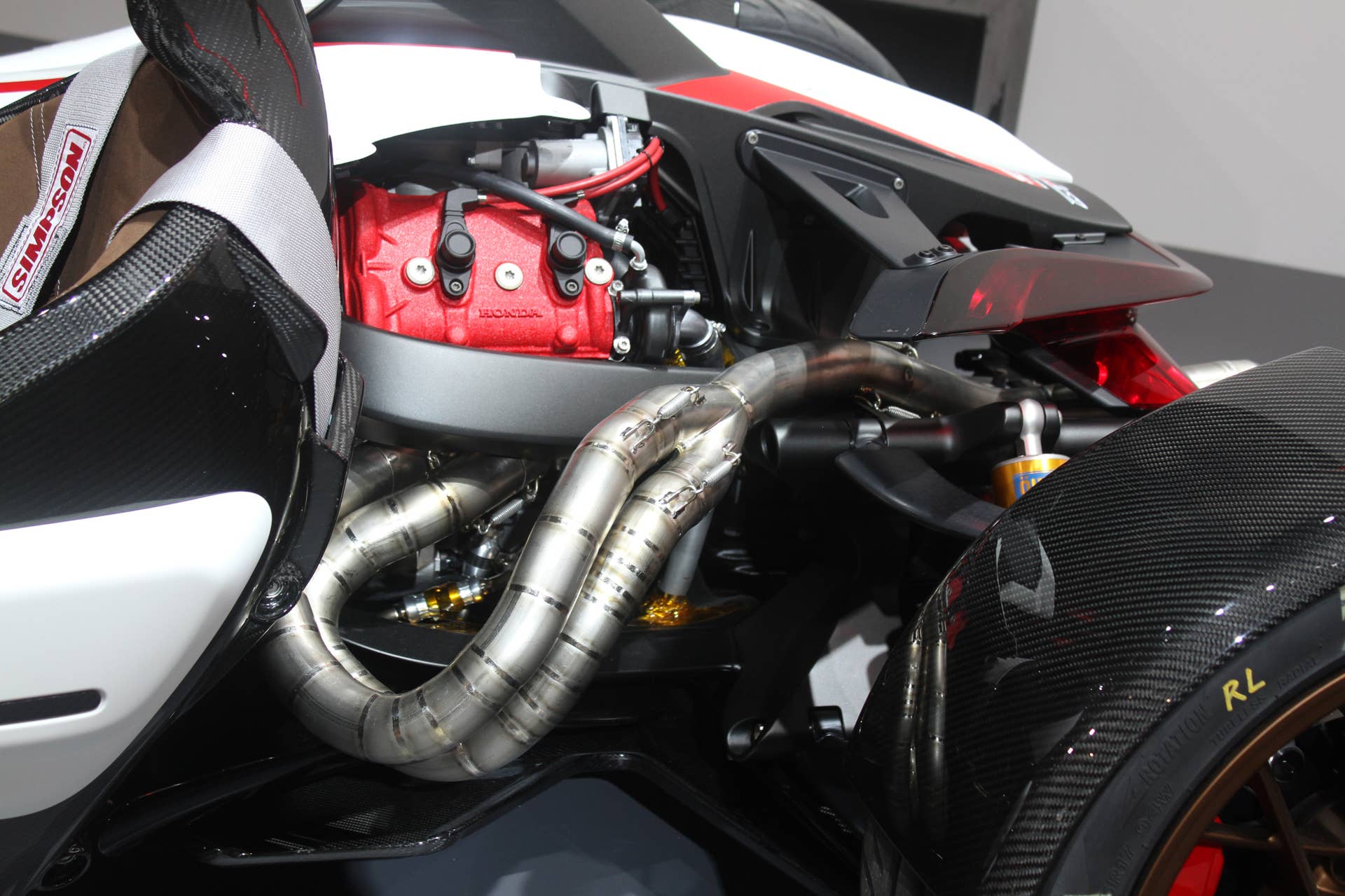Honda Project 2  &  4 concept that combines the company's RC-213vs MotoGP bike with a car, at the 2015 Frankfurt Motor Show, engine detail.