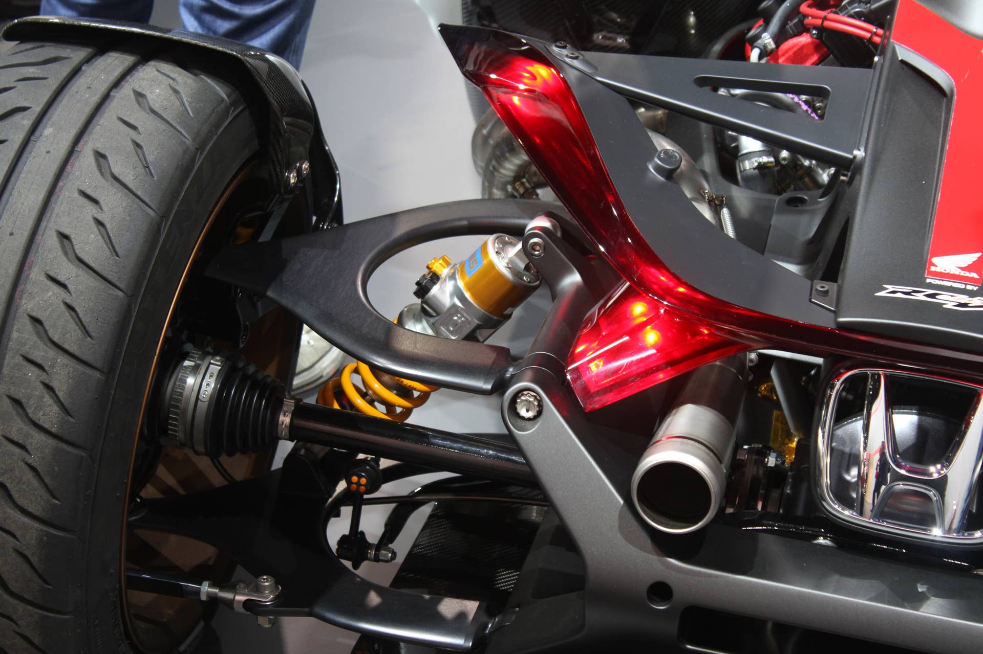 Honda Project 2  &  4 concept that combines the company's RC-213vs MotoGP bike with a car, at the 2015 Frankfurt Motor Show, rear suspension detail.