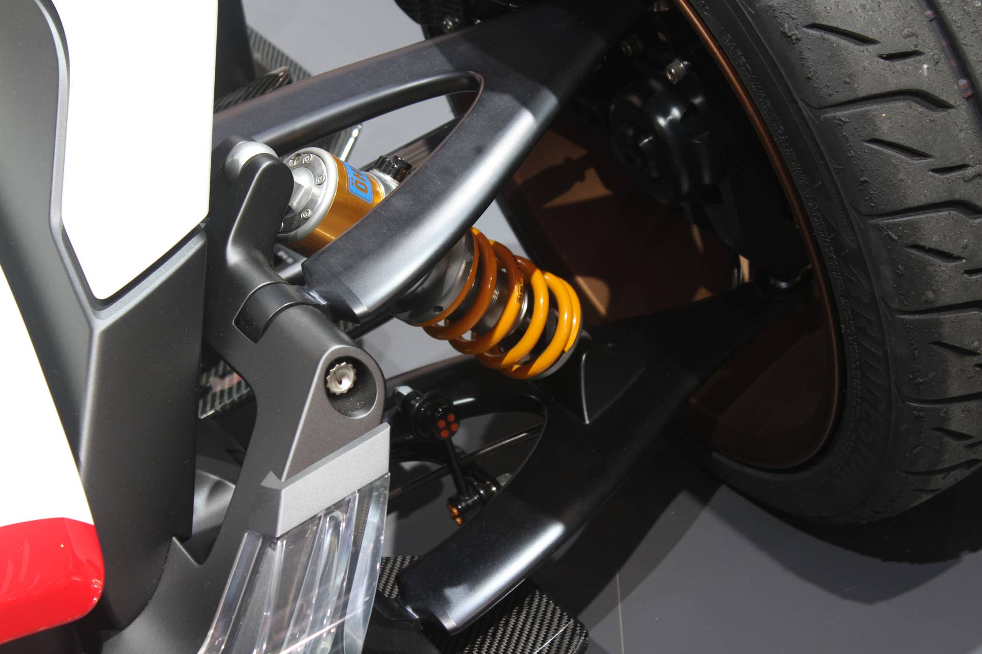 Honda Project 2  &  4 concept that combines the company's RC-213vs MotoGP bike with a car, at the 2015 Frankfurt Motor Show, detail of front suspension.