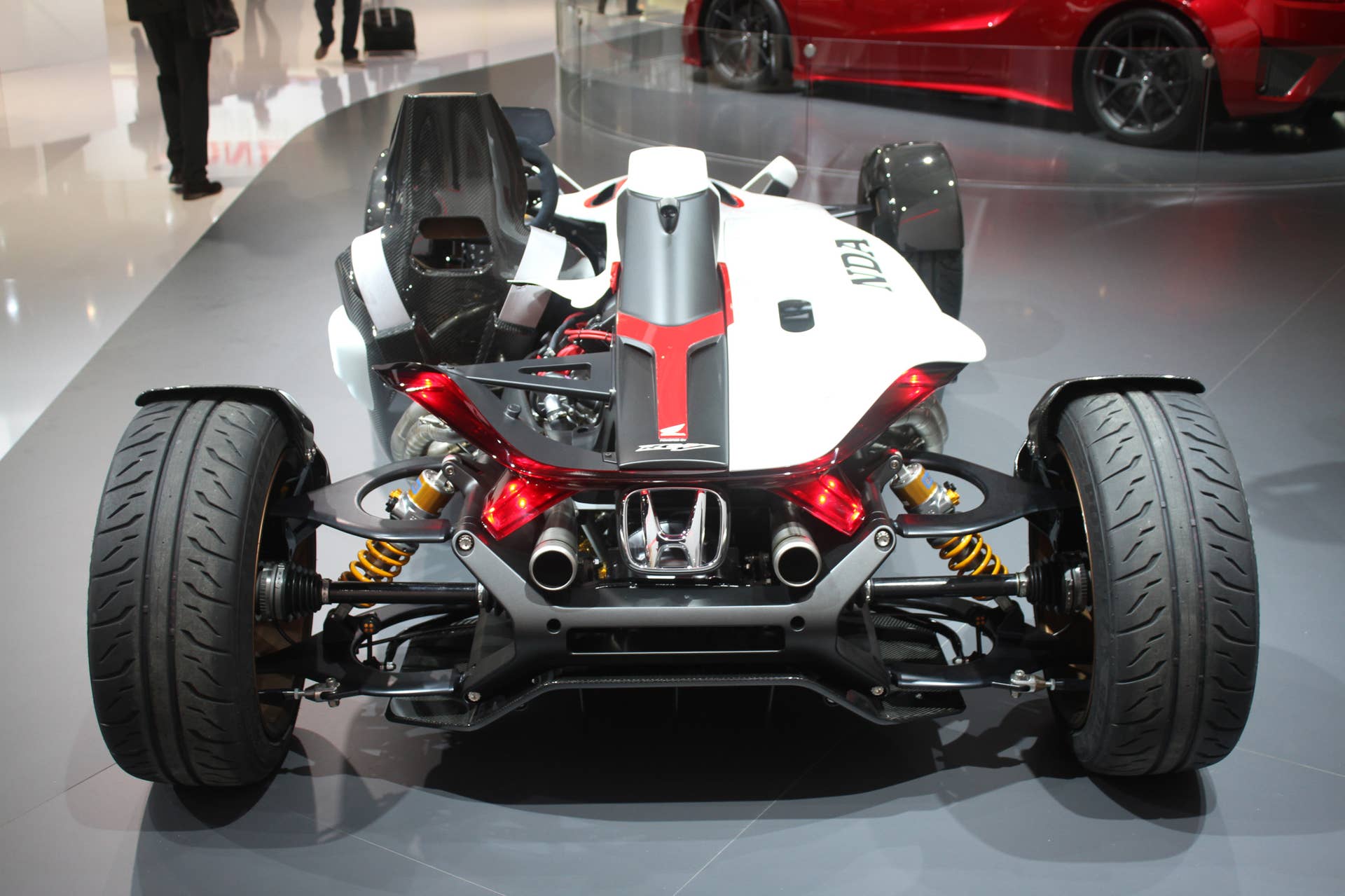 Honda Project 2  &  4 concept that combines the company's RC-213vs MotoGP bike with a car, at the 2015 Frankfurt Motor Show, rear view.