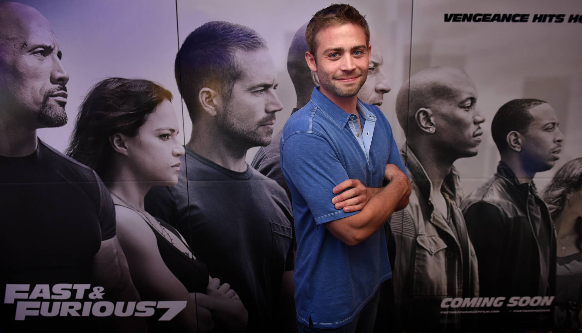 CRAIGIEBURN, AUSTRALIA - APRIL 12: (EUROPE AND AUSTRALASIA OUT) Cody Walker unveils a giant mosaic plaque dedicated to his late brother, American actor Paul Walker, at United Cinemas in Craigieburn, New South Wales. He is in Sydney to promote the new movie 'Furious 7' and kick off the Paul Walker Car Convoy Charity Drive. (Photo by Tony Gough/Newspix/Getty Images)