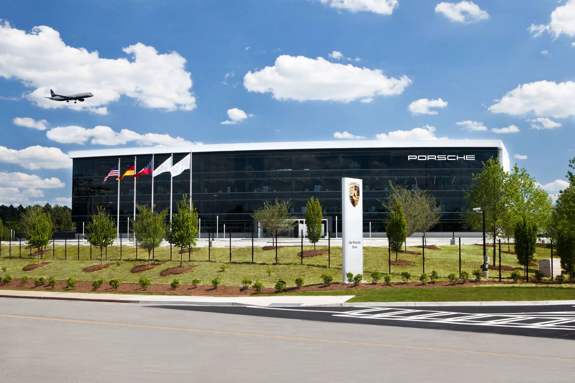 porsche experience center with plane