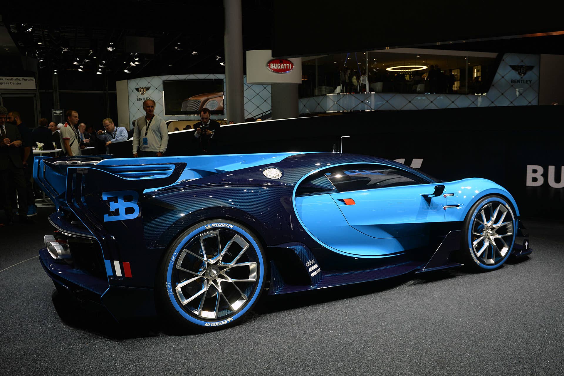 The Bugatti Vision Gran Turimso, designed for the Sony Playstation game Gran Turismo, at the 2015 Frankfurt Motor Show, near rear three-quarter view.