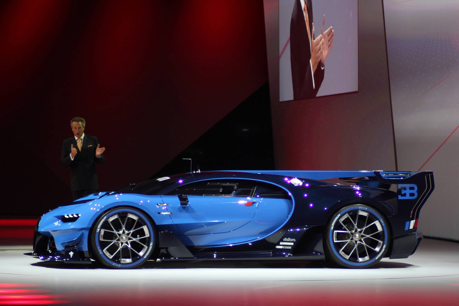 The Bugatti Vision Gran Turimso, designed for the Sony Playstation game Gran Turismo, is shown off at Volkswagen Group Night ahead of the 2015 Frankfurt Motor Show, side view with brand CEO Wolkgang Durheimer.