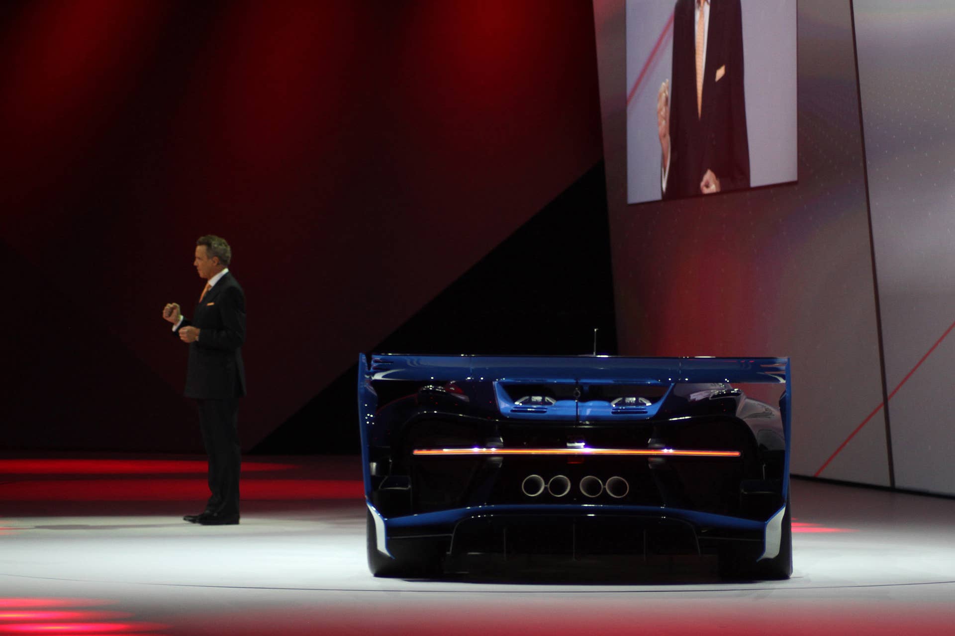 The Bugatti Vision Gran Turimso, designed for the Sony Playstation game Gran Turismo, is shown off at Volkswagen Group Night ahead of the 2015 Frankfurt Motor Show, rear view with brand CEO Wolfgang Durheimer.