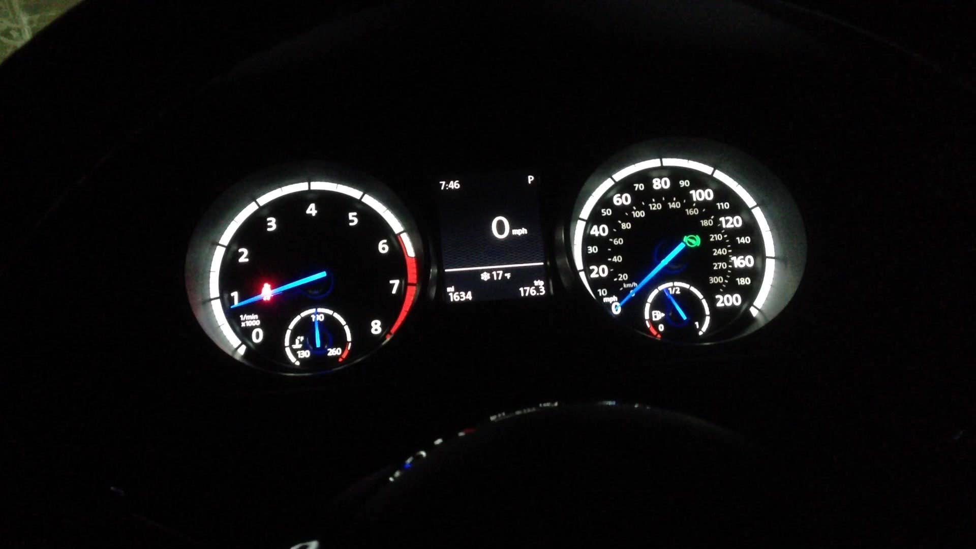 Autoblog's Greg Migliore shows off the interior of the 2015 Volkswagen Golf R at night.