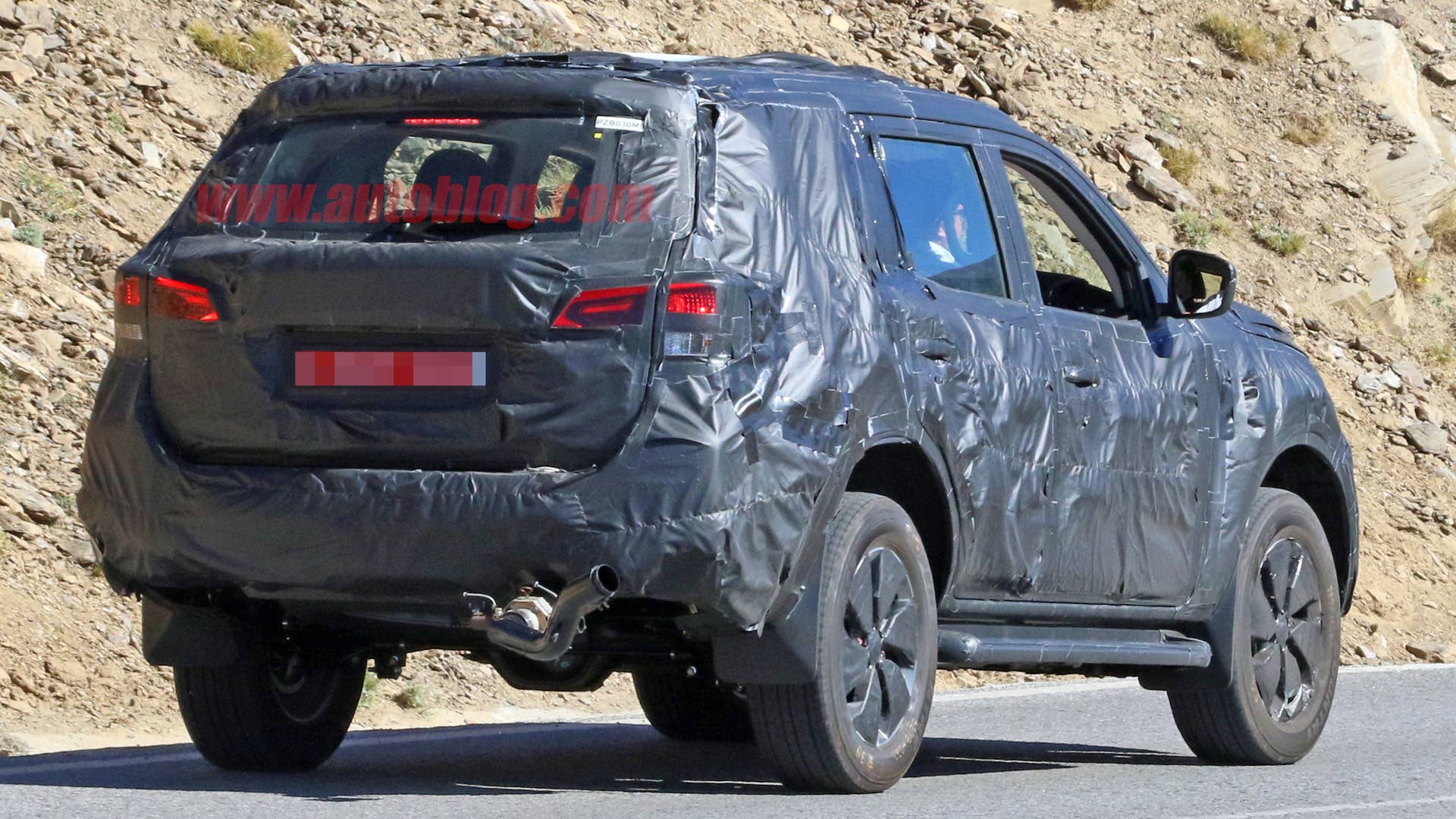 Nissan Navara SUV Spy Shots Three Quarter Rear Exterior