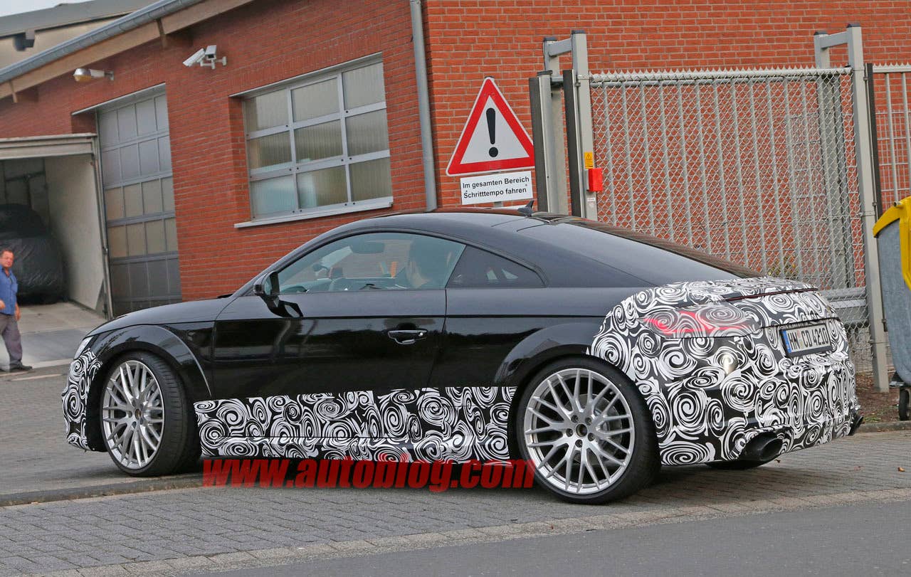 camouflaged audi tt rs spy shot rear three quarters