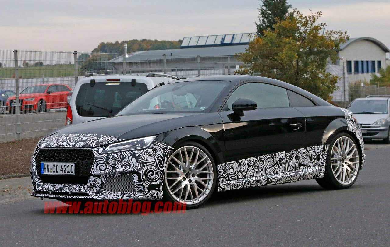camouflaged audi tt rs spy shot three quarters