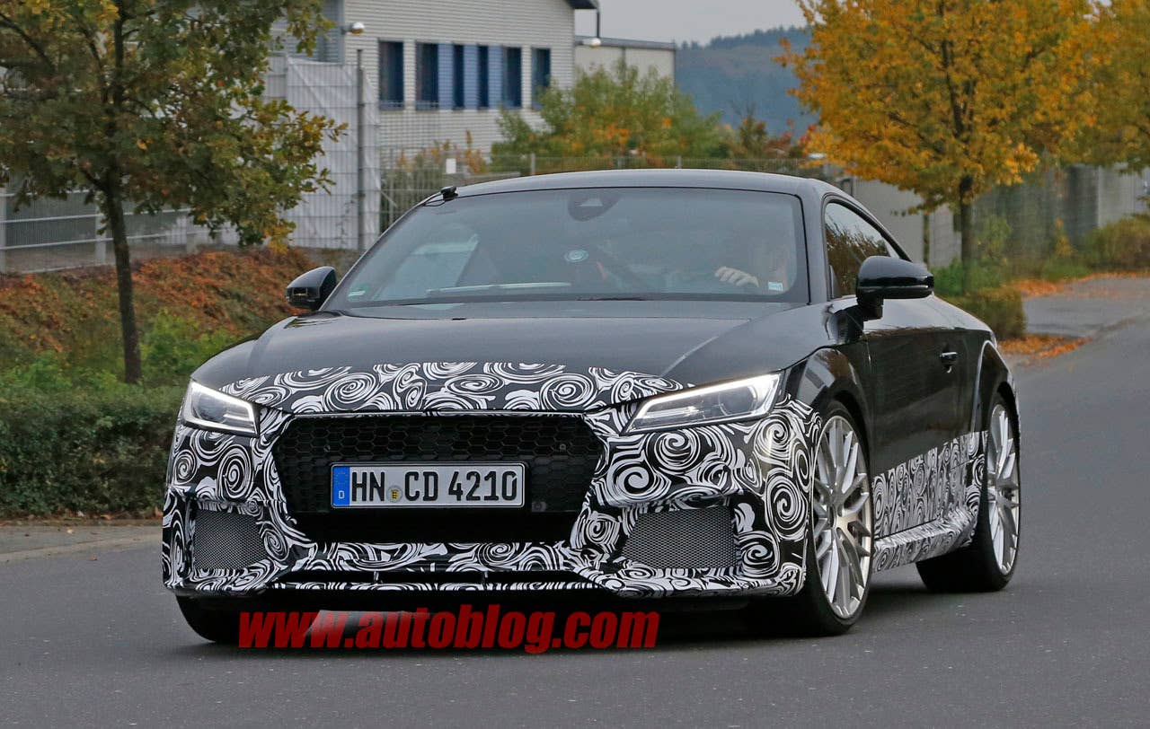 camouflaged audi tt rs spy shot front three quarters