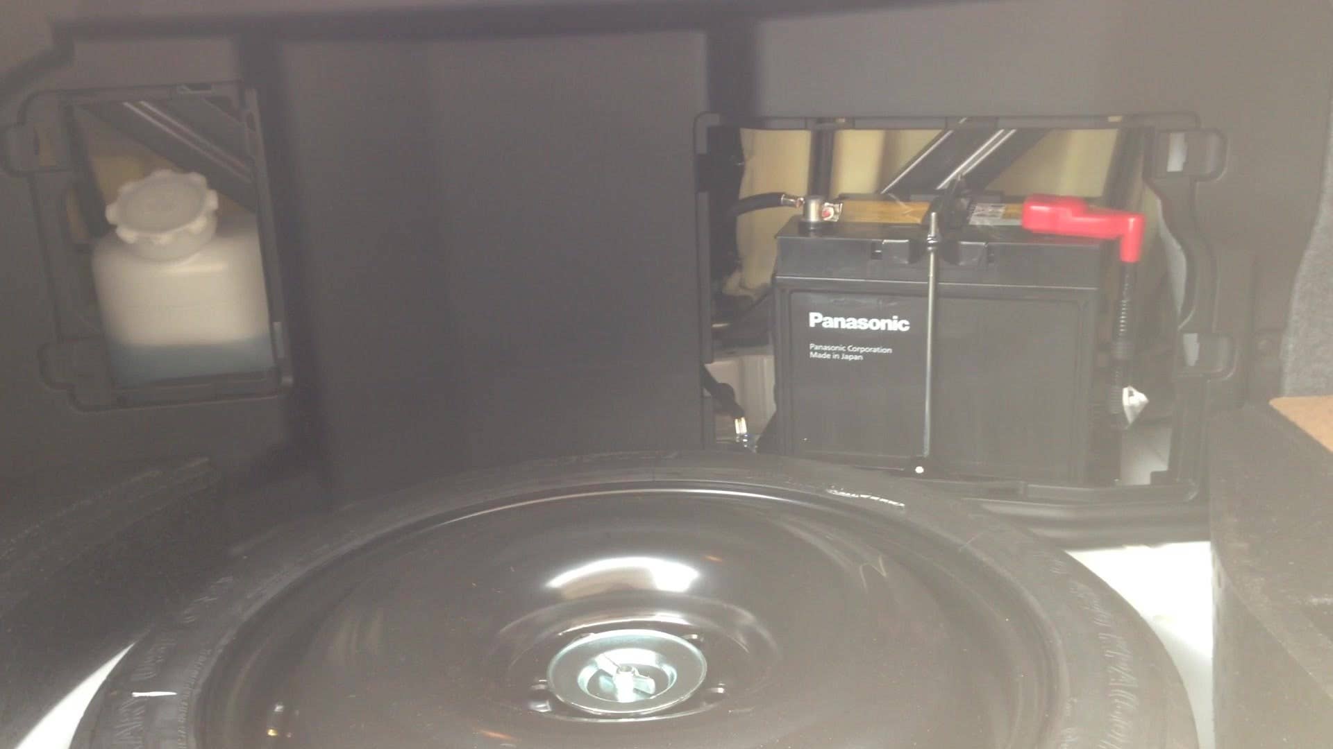 Autoblog senior editor Greg Migliore shows the hidden compartments in the trunk of the 2015 Mitsubishi Lancer Evolution MR.