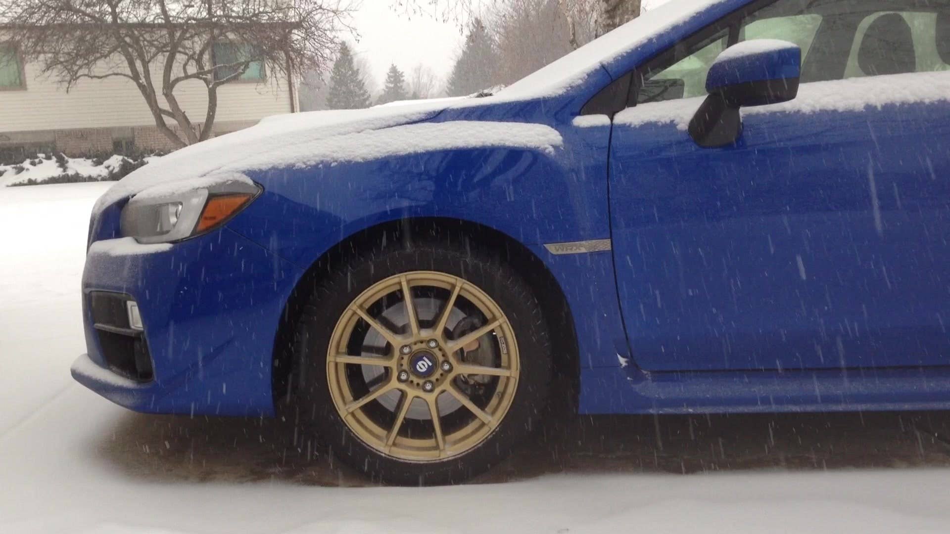 Autoblog's Greg Migliore highlights the winter tires and gold wheels on the longterm 2015 Subaru WRX.