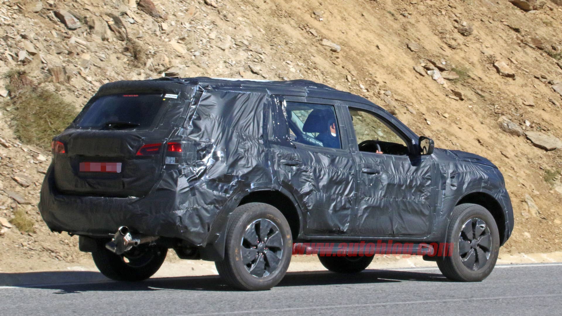 Nissan Navara SUV Spy Shots Three Quarter Rear End Exterior