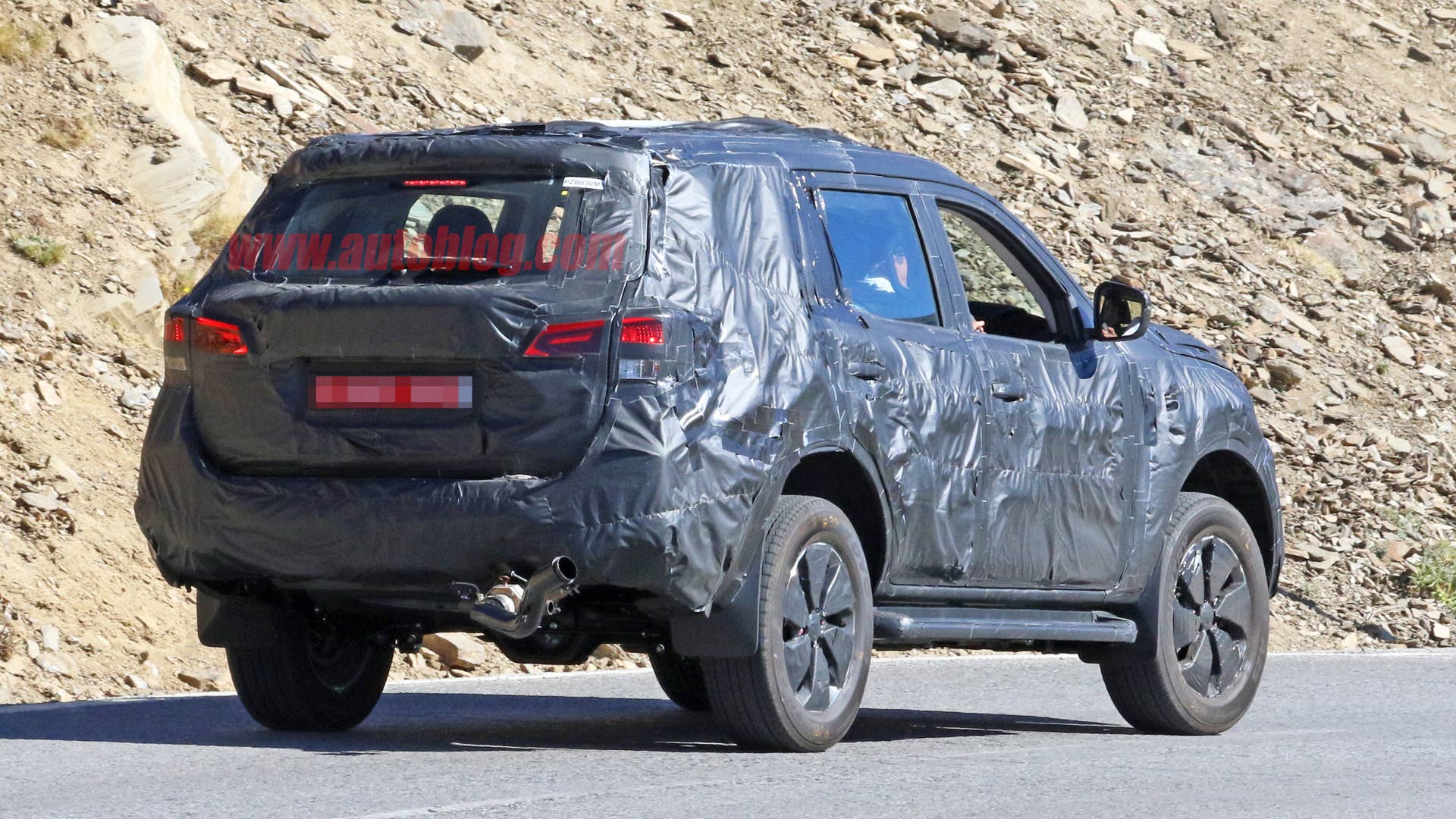 Nissan Navara SUV Spy Shots Three Quarter Rear Exterior