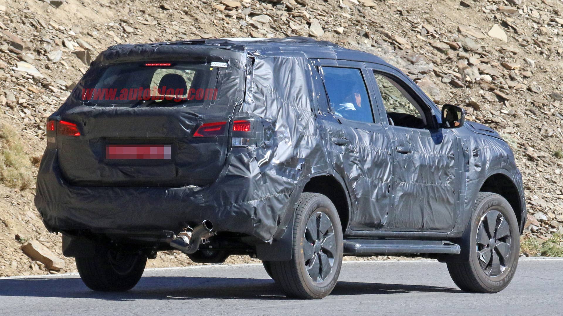 Nissan Navara SUV Spy Shots Three Quarter Rear Exterior