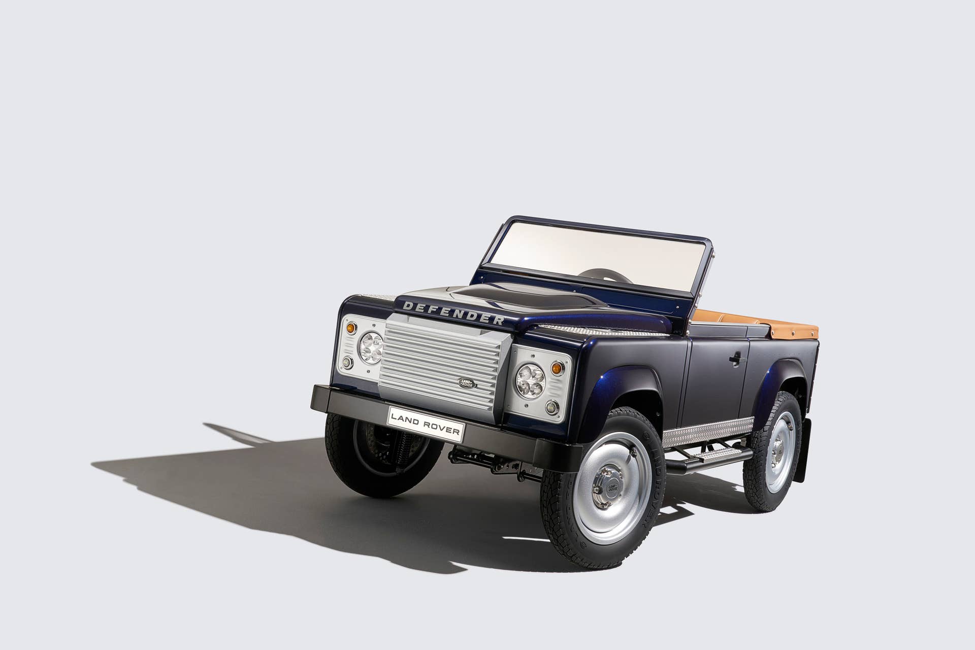 land rover defender pedal car angled three quarters