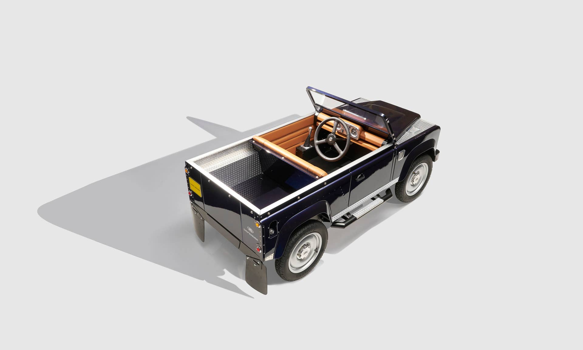 land rover defender pedal car top rear three quarters