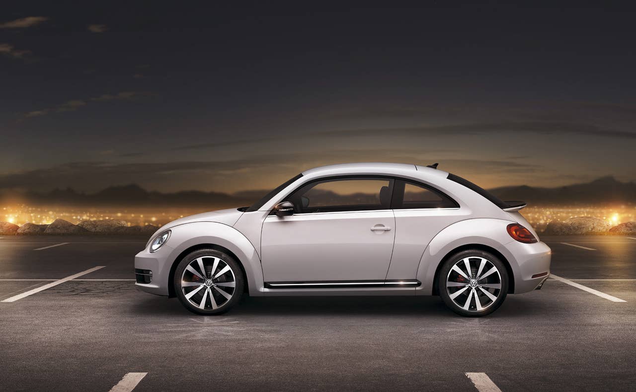 2012 Volkswagen Beetle exterior from side in white