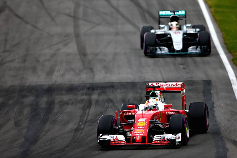 Sebastian Vettel of Germany driving the (5) Scuderia Ferrari SF16-H Ferrari 059/5 turbo (Shell GP) leads Lewis Hamilton of Great Britain driving the (44) Mercedes AMG Petronas F1 Team Mercedes F1 WO7 Mercedes PU106C Hybrid turbo on track during the Canadian Formula One Grand Prix at Circuit Gilles Villeneuve on June 12, 2016 in Montreal, Canada.