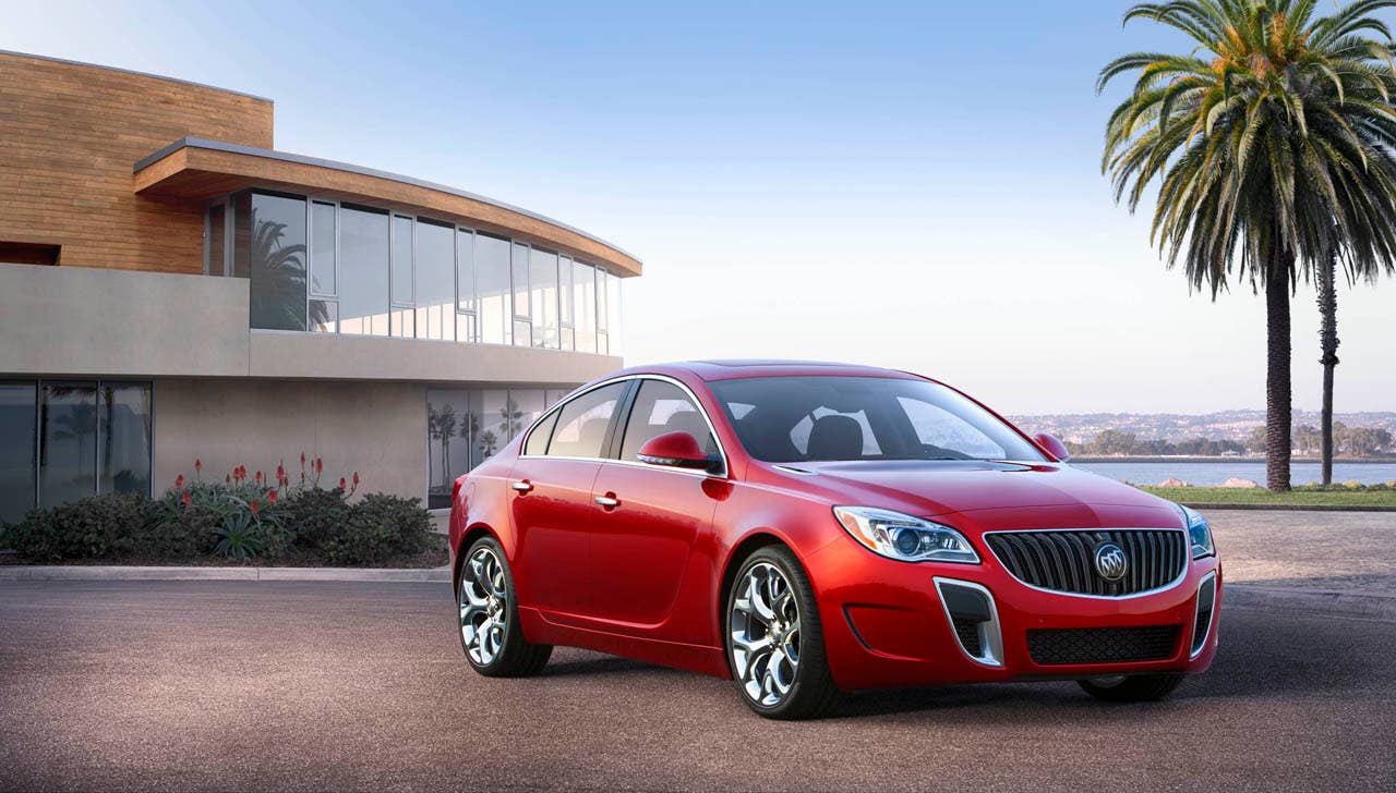 2014 Buick Regal GS¾ front view with Copper Red Metallic exterior color and 20-inch Alloy polished wheels