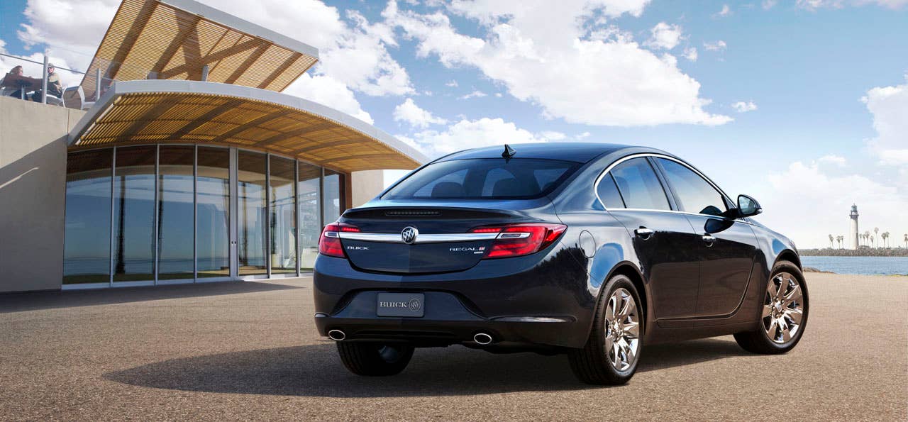 2014 Buick Regal Turbo  rear view with Graphite Blue Metallic exterior color and 18-inch chrome wheels