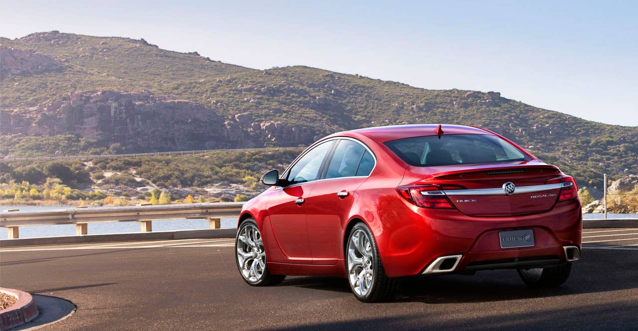 2014 Buick Regal GS  rear view with Copper Red Metallic exterior color and 20-inch Alloy polished wheels