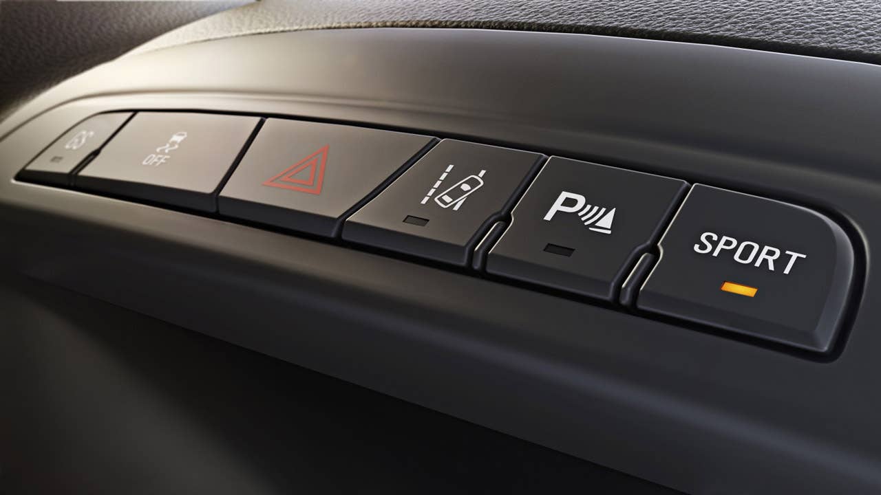 2014 Buick Regal GS Interactive Drive Control System and Lane Departure Warning, buttons.