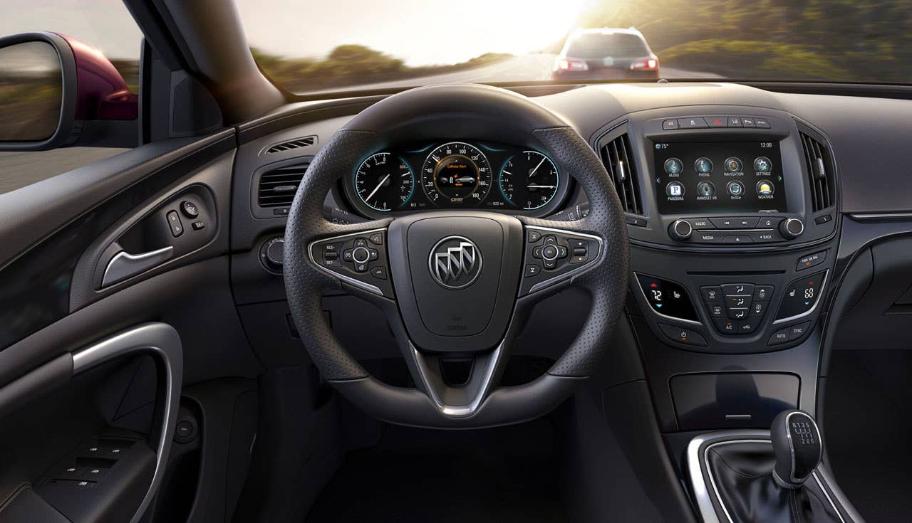 2014 Buick Regal GS Ebony interior, Front Collision Alert displayed in the 8-inch instrument panel (IP). This image also features next-generation IntelliLink infotainment system and 8-inch instrument panel (IP)