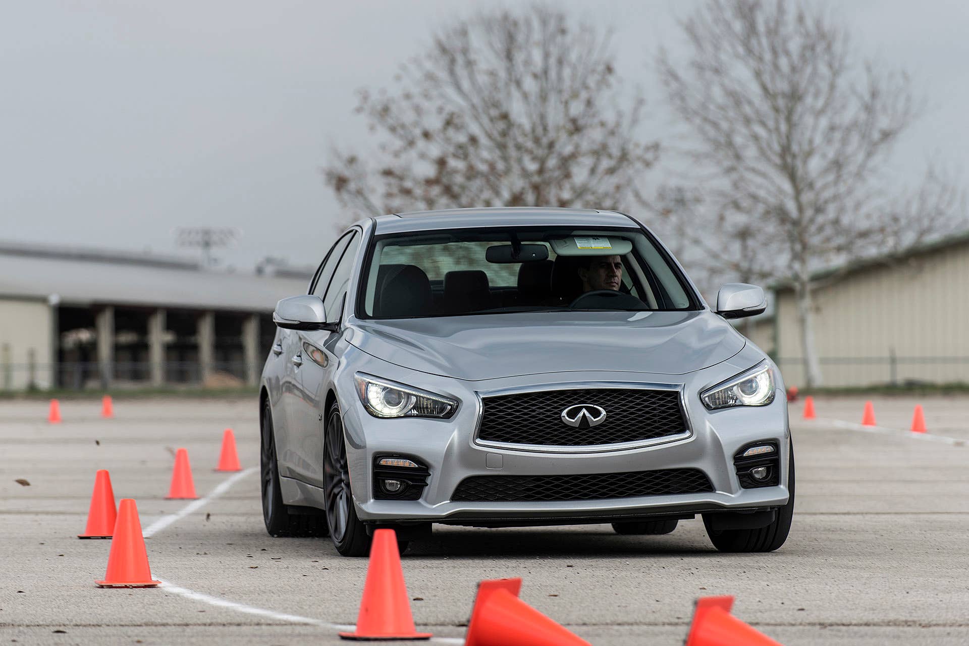 2016 Infiniti Q50 Red Sport 400 driving