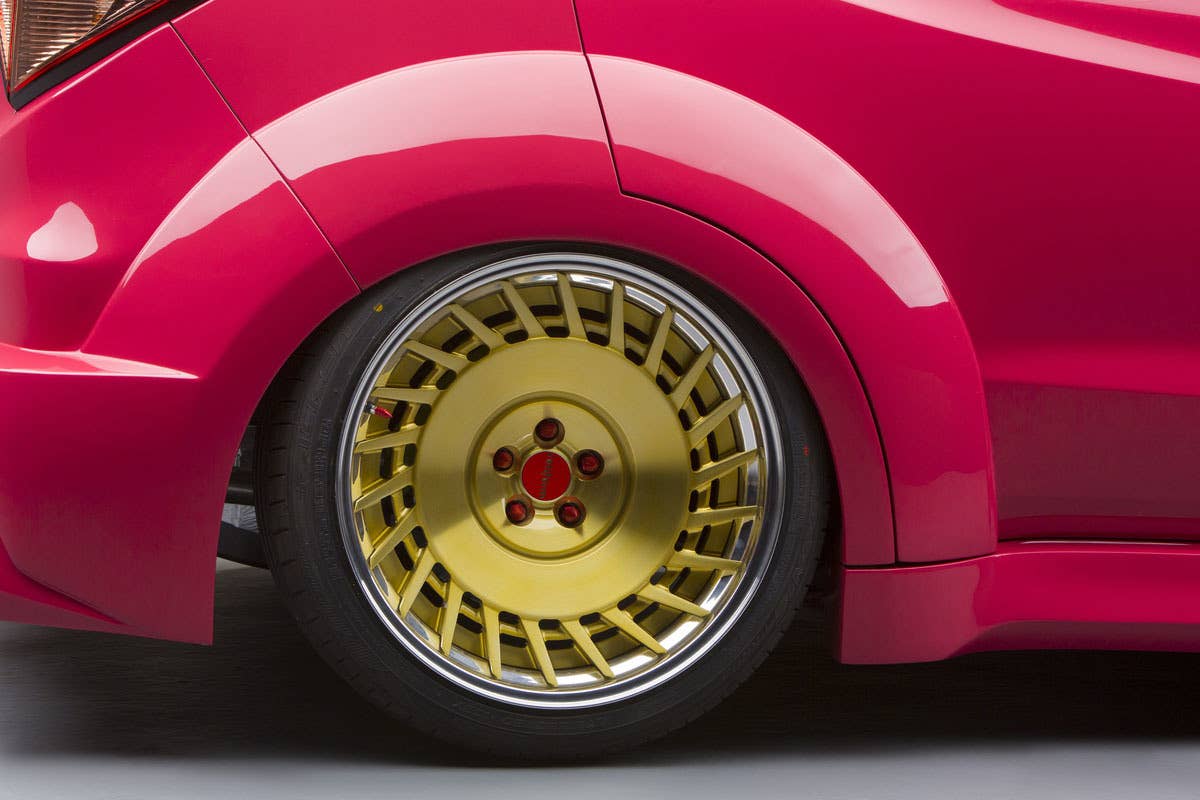 pink honda hr-v sema gold metallic wheels