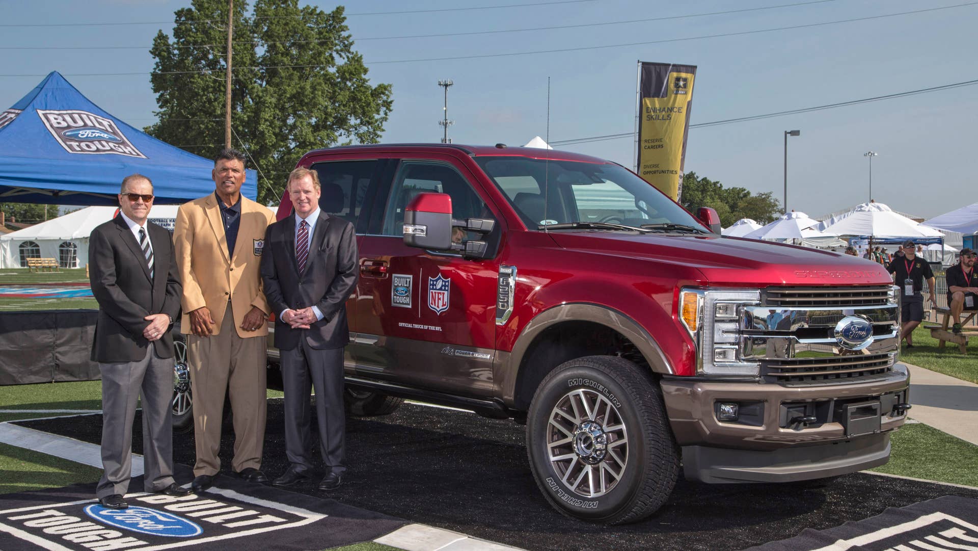 Ford F-Series NFL Sponsorship Ford's Mark Laneve, NFL Hall of Famer Anthony Munoz, and NFL Commissioner Roger Goodell