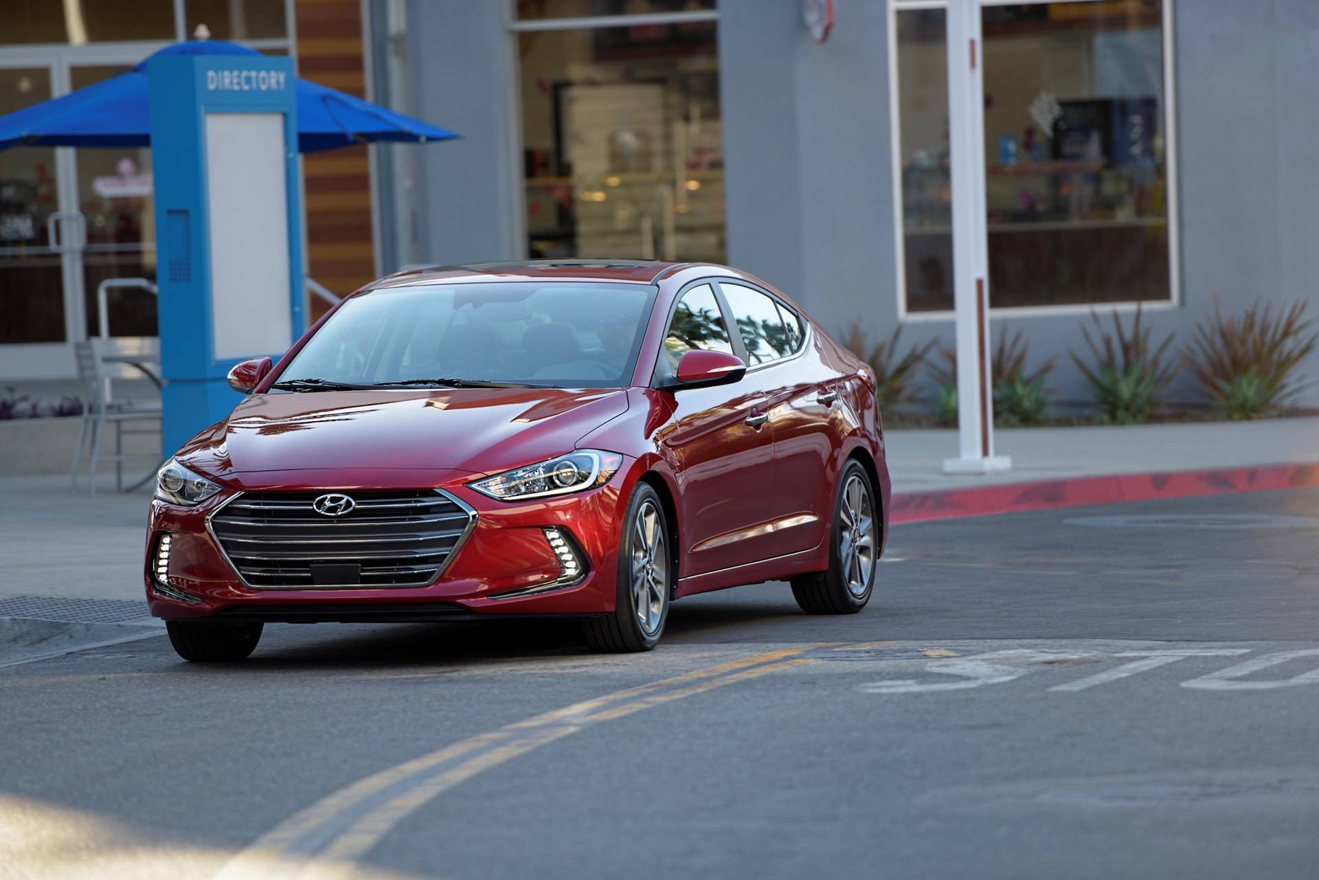 2017 Hyundai Elantra sedan in red in the city