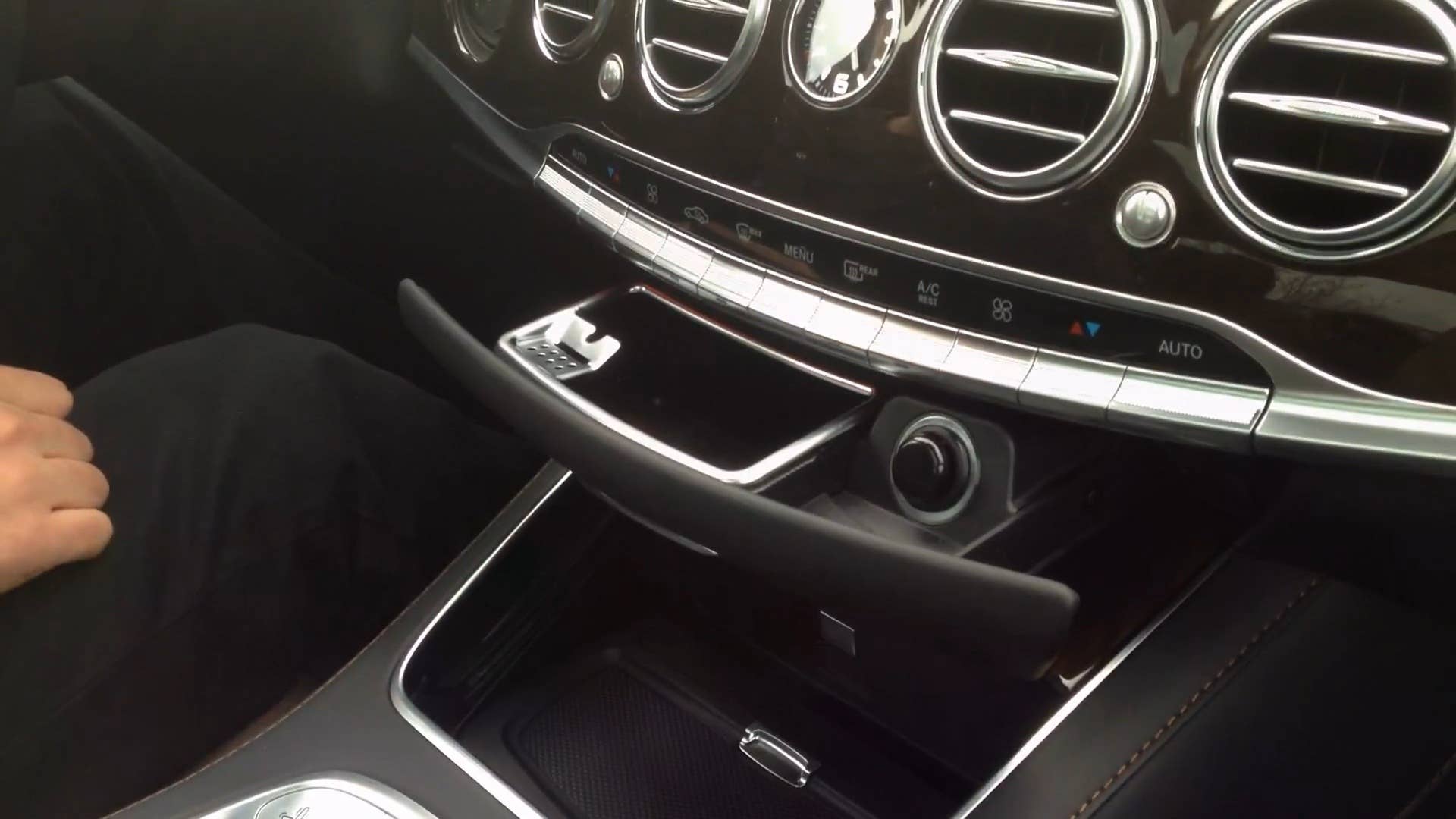 Adam Morath explains how to use the ash tray in the 2016 Mercedes-Maybach S600.