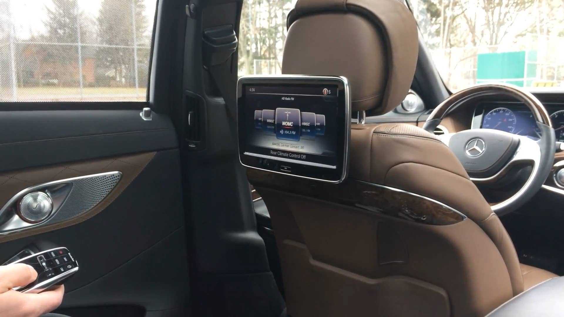 utoblog's Greg Migliore demonstrates the rear-passenger infotainment screens on the 2016 Mercedes-Maybach S600.