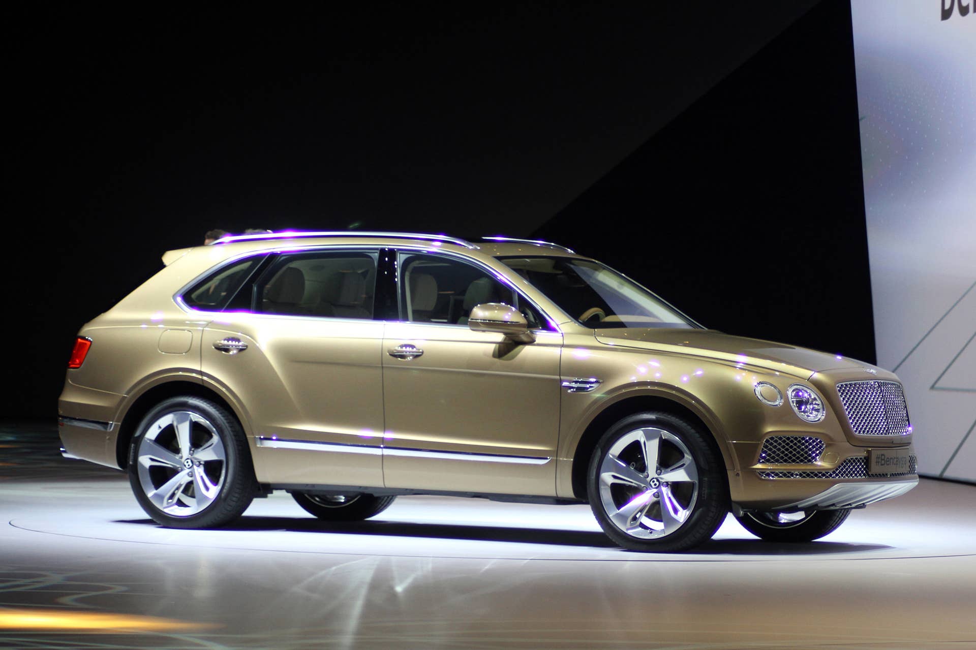 The Bentley Bentayga introduced at VW Group Night, front three-quarter view.