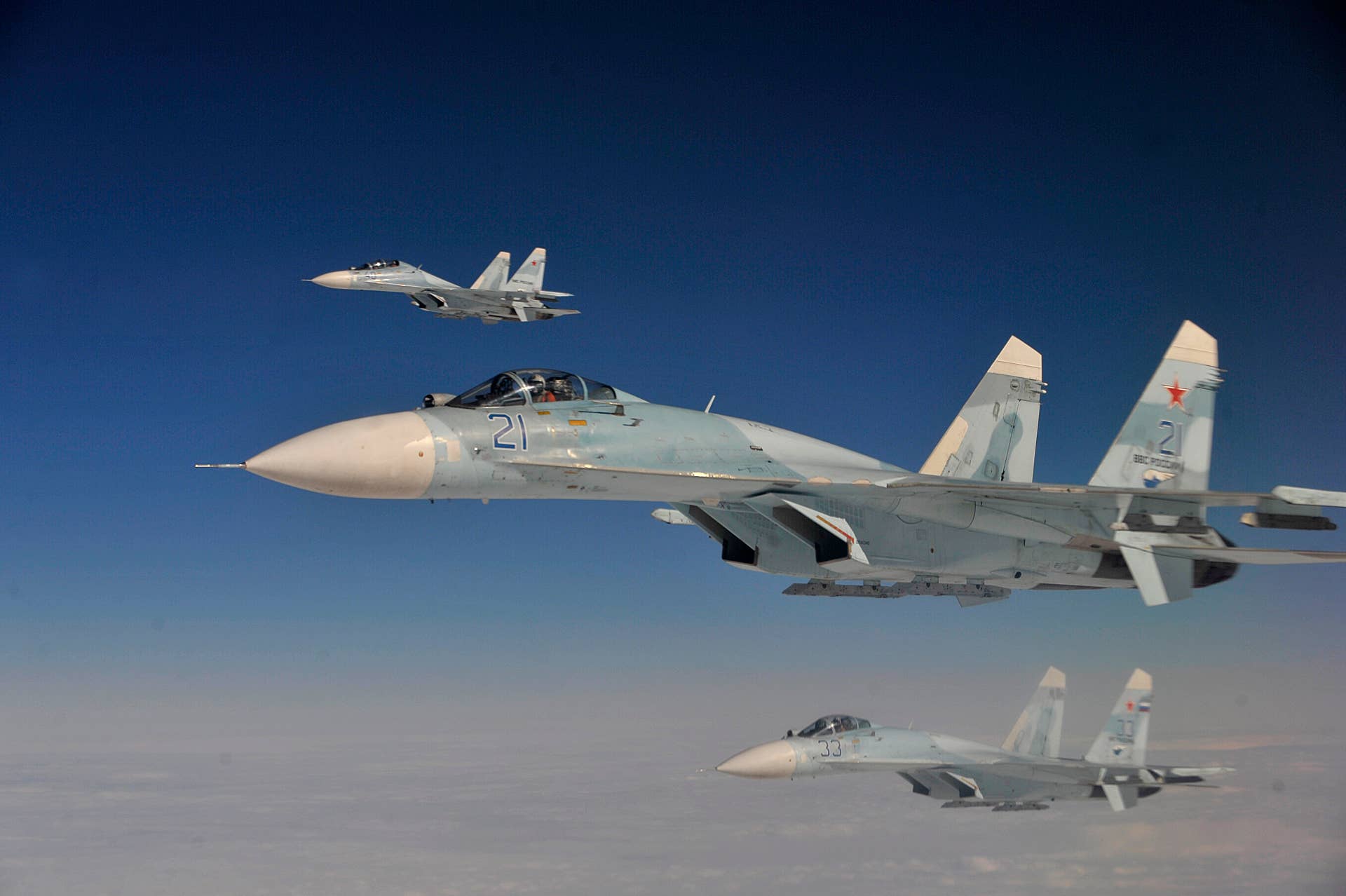 A Russian Federation Air Force Su-27 Sukhois intercepts a simulated hijacked aircraft entering Russian airspace, Aug. 27, 2013 at Exercise Vigilant Eagle (VE) 13. This exercise is the 5th in a series of cooperative exercises that provide an opportunity for Russia, Canada, and United States military personnel to enhance their international partnership and to cooperatively detect, track, identify, and follow a hijacked aircraft as it proceeds across international boundaries.(U.S. Air Force photo by Tech. Sgt. Jason Robertson/Released)