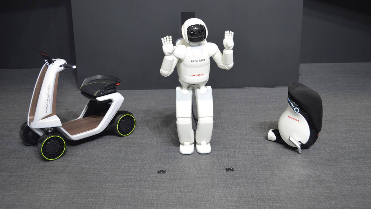 honda wander walker asimo uni-cub