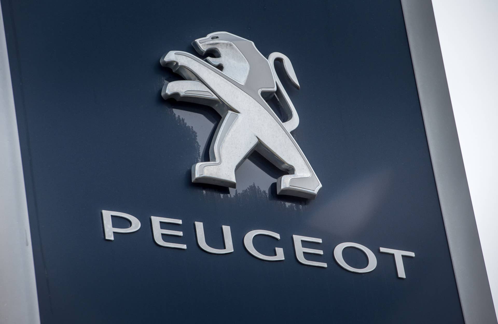 The logo of French carmaker Peugeot is pictured on February 10, 2017 in Villeneuve d'Ascq, northern France. The French Directorate General for Competition Policy, Consumer Affairs and Fraud Control (DGCCRF) 'finalized its investigations concerning the engines of the Peugeot Citroen Automobiles SA group and transmitted its findings to the courts', in this case the public prosecutor's office of Versailles, the Ministry of Economy said in a statement on February 9, 2017. / AFP / PHILIPPE HUGUEN (Photo credit should read PHILIPPE HUGUEN/AFP/Getty Images)