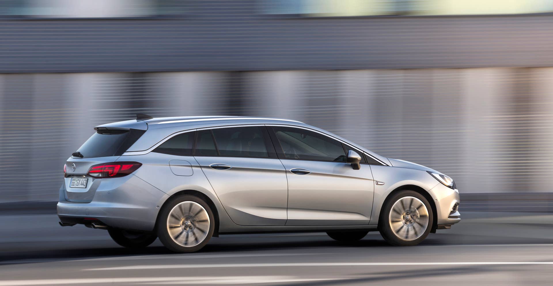 2016 Opel Astra Sports Tourer estate rear side 3/4 moving