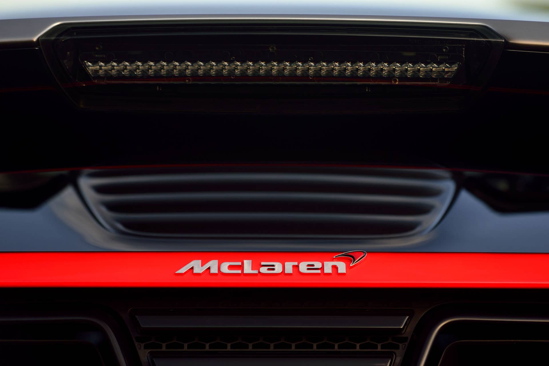2012 McLaren MP4-12C High Sport rear detail badge