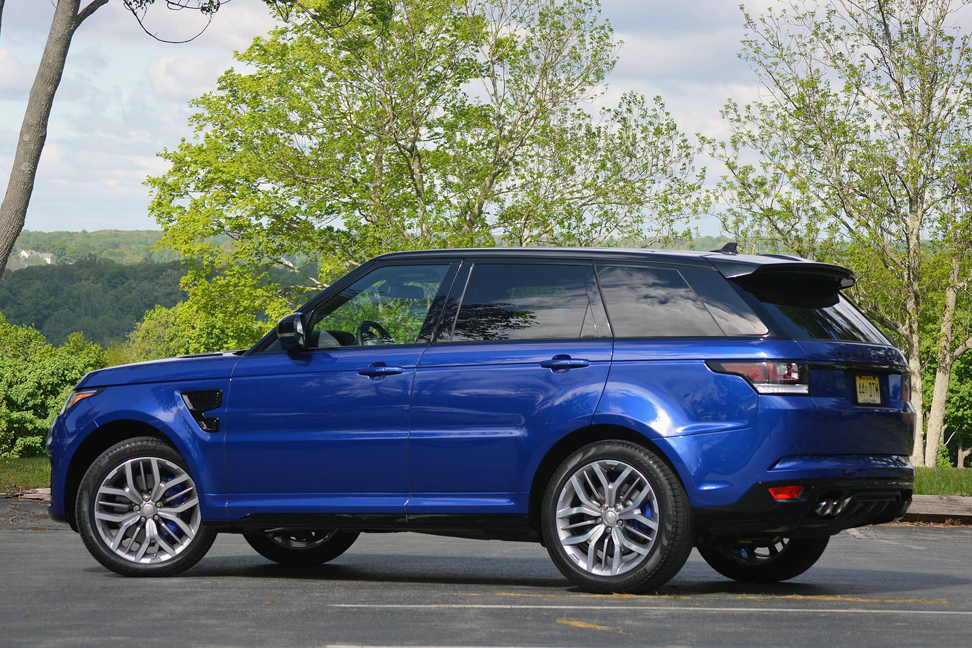 2015 Land Rover Range Rover Sport SVR rear 3/4 view